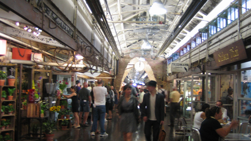 Chelsea Market, NYC. The way in which activities spill out onto the corridor and the high ceiling make it seem like an outdoor space. Photo: LShieh